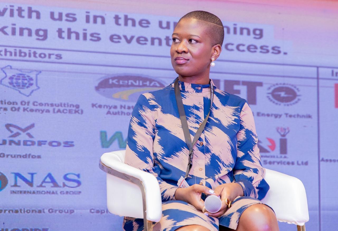 Paula speaking on a panel